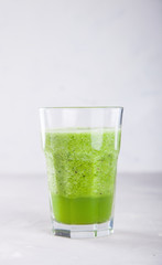 Smoothies Green. Drink Cocktail Spinach,Apple,Kiwi,Lemon,lime,avocado.Food or Healthy diet concept.Vegetarian.Copy space for Text. selective focus.