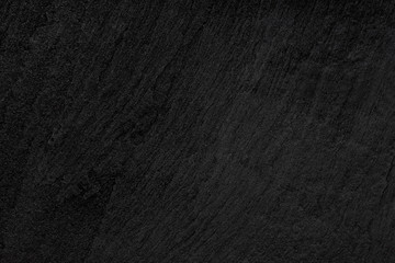 Dark grey black slate background or texture.