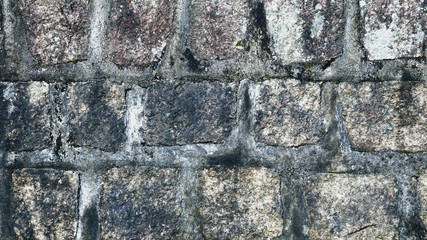 Wall of irregular stones
