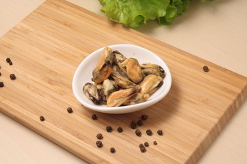 Mussels in oil on a plate