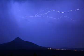 Naklejka na ściany i meble Lightning over the Takkeli Mountains