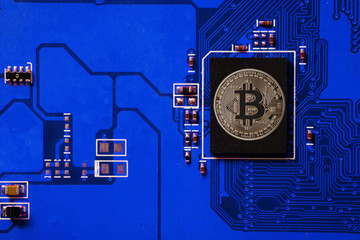 Closeup of bitcoin  circuit board with bitcoin processor