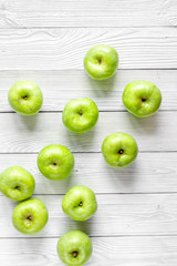 fitness food with green apples on white background top view