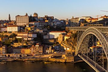 Fototapeta na wymiar View of Ribeira at Douro river and Dom Luis I bridge, Porto, Portugal.