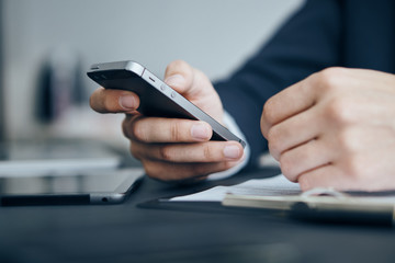 Businessman holding a phone, businessman working, businessman