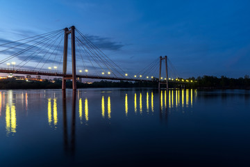Fototapeta na wymiar Pedestrian cable-stayed bridge to the Tatyshev island in Krasnoyarsk