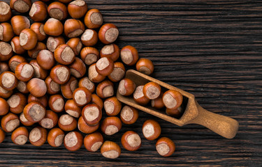 hazelnut on a brown wooden table,top view