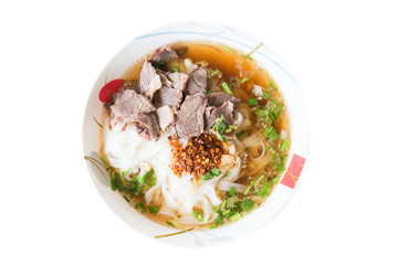 Thai food,Spicy noodle soup in a bowl isolated on white background