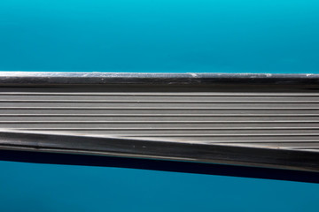 Turquoise and chrome detail on a classic car