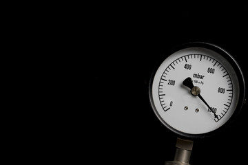pressure gauge on black background
