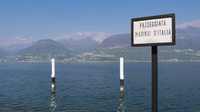 Cartel place names on the lakefront Colico - Lake Como