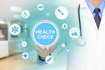Doctor hand touching HEALTH CHECK sign on virtual screen