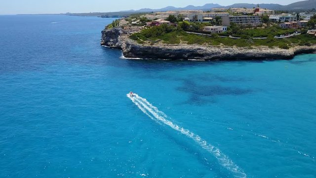 Aerial landscape of the beautiful bay of Cala Mandia with a wonderful turquoise sea, Porto Cristo, Majorca, Spain