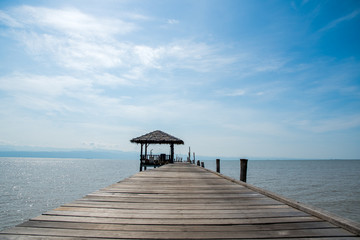 Perspective view of a wooden pier on the sea
