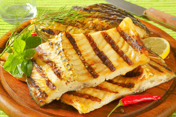 Grilled carp fillets