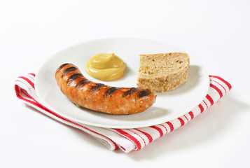 Grilled bratwurst with mustard