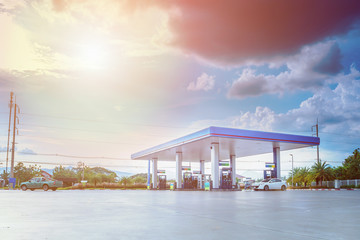 Gas station with clouds and blue sky