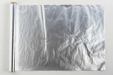 roll of aluminum foil isolated on white background