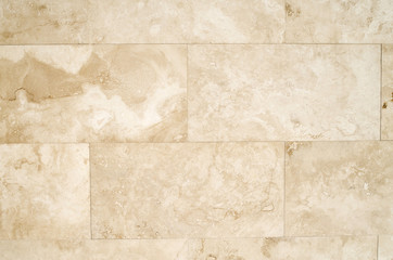 Naklejka premium New orange stone wall closeup