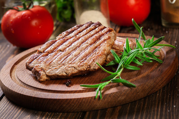 Succulent portions of grilled fillet mignon served with rosemary