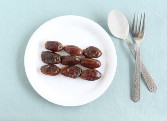 Healthy food dates in a plate.