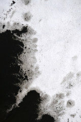 Black Ink Conveyed Over White Close-up Paper.