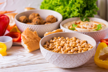 Falafel, pita, hummus and chickpea  with vegetables. horizontal view