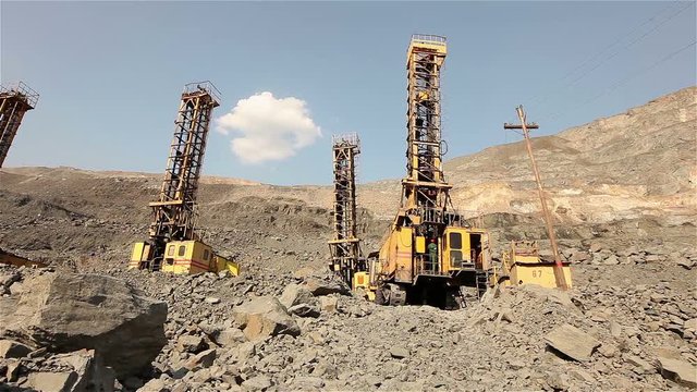 Quarry drilling machine, Quarry, The pit drill panorama, Industrial drilling rig in a quarry, large drilling machine