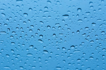Abstract macro photo background with water drops on glass