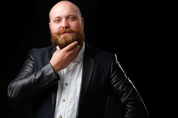 Man stroking his ginger beard