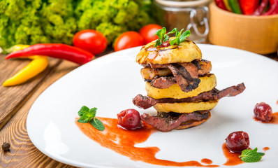 baked apples and grilled meat