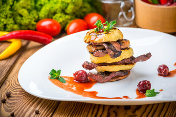 baked apples and grilled meat