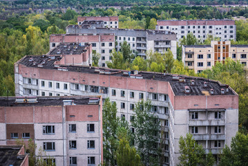 Fototapeta na wymiar Aerial view on residential area of abandoned Pripyat city in Chernobyl Exclusion Zone, Ukraine