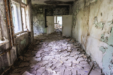 Corridor of abandoned middle school in Pripyat city in Chernobyl Exclusion Zone, Ukraine