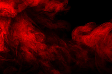 Red smoke on a black background