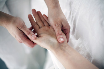 manual therapy on the palms of the hands