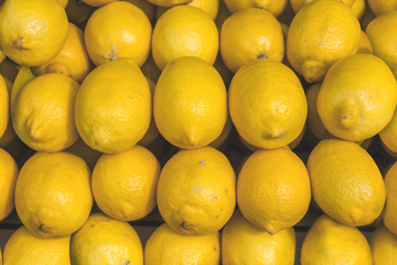 Fresh helathy sour citrus pile lemon on market ready fot selling