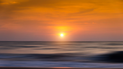 Naklejka na ściany i meble Motion of andaman sea with sunset, Thailand
