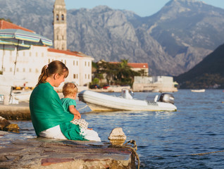 Fototapeta na wymiar mother with little daughter on vacation in Montenegro