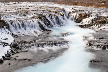 Fototapeta premium Bruarfoss (Blue Waterfall) at the south of Iceland in winter.