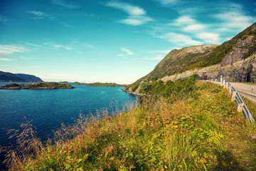 View at the fjord. Rocky beach. Beautiful nature Norway. Lofoten islands. The road along the fjord