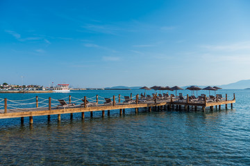 Obraz premium Cesme, Turkey - June 17, 2017 : Ilica Beach view in June. Ilica Beach is popular tourist destination in Turkey.