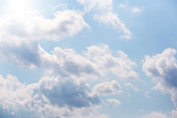 light Blue sky with white close-up clouds