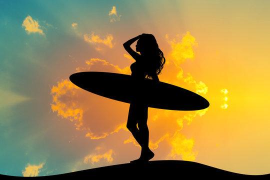 girl with surf at sunset