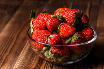Bowl with fresh strawberries
