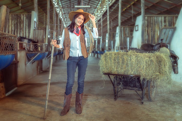 Cowgirls working at a horse farm,Sakonnakhon,Thailand.