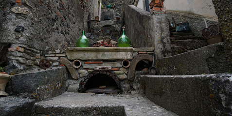 Fototapeta na wymiar Old brick stove decoration in Francavilla di Sicilia, Italy.