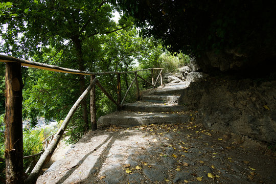 Forest road in Parco Fluviale dell'Alcantara. Francavilla di Sicilia, Italy.