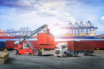 Logistics import export background and transport industry of forklift handling container box loading at seaport