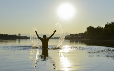 time of sunrise in cold water with energetic movements